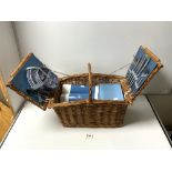 A VINTAGE WICKER PICNIC HAMPER