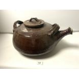 TRENTHAN DELELIBA - A LARGE 1960S STUDIO BROWN POTTERY TEAPOT, 50 X 38CMS