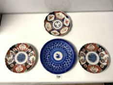 THREE JAPANESE IMARI WALL PLATES, 22CMS, SOME FAULTS, AND AN EASTERN BLUE & WHITE TIN GLAZED PLATE
