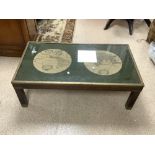 VINTAGE ATLAS COFFEE TABLE IN METAL AND WOOD WITH GLASS TOP FEATURING TWO ATLAS, 107 X 59 X 37CMS