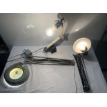 TWO INDUSTRIAL METAL WALL-MOUNTED ANGLEPOISE LAMPS AND AN INDUSTRIAL MAGNIFYING LAMP