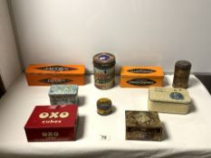 A QUANTITY OF VINTAGE TINS, INCLUDING BOURNVILLE, JACOBS, AND MORE