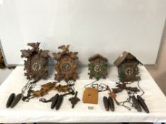 FOUR VINTAGE WEST GERMAN CUCKOO CLOCKS