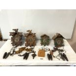 FOUR VINTAGE WEST GERMAN CUCKOO CLOCKS