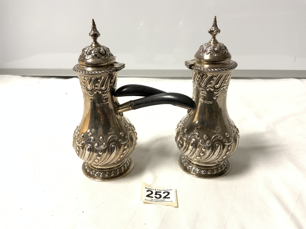 A PAIR OF HALLMARKED SILVER GEORGIAN DESIGN EMBOSSED CHOCOLATE POTS WITH EBONY HANDLES - SHEFFIELD - Image 3 of 4
