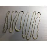 CULTURED PEARL NECKLACE WITH A 9CT WHITE GOLD CLASP, AND FIVE OTHER SIMULATED PEARL NECKLACES WITH