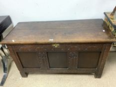 ANTIQUE OAK COFFER WITH LATER CARVED DECORATION TO FRONT, 122 X 53 X 66CMS
