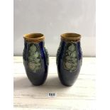 A PAIR OF ROYAL DOULTON GLAZED STONE WARE BALUSTER VASES WITH PANELS OF FLOWERS DECORATION -