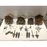 FOUR VINTAGE WEST GERMAN CUCKOO CLOCKS