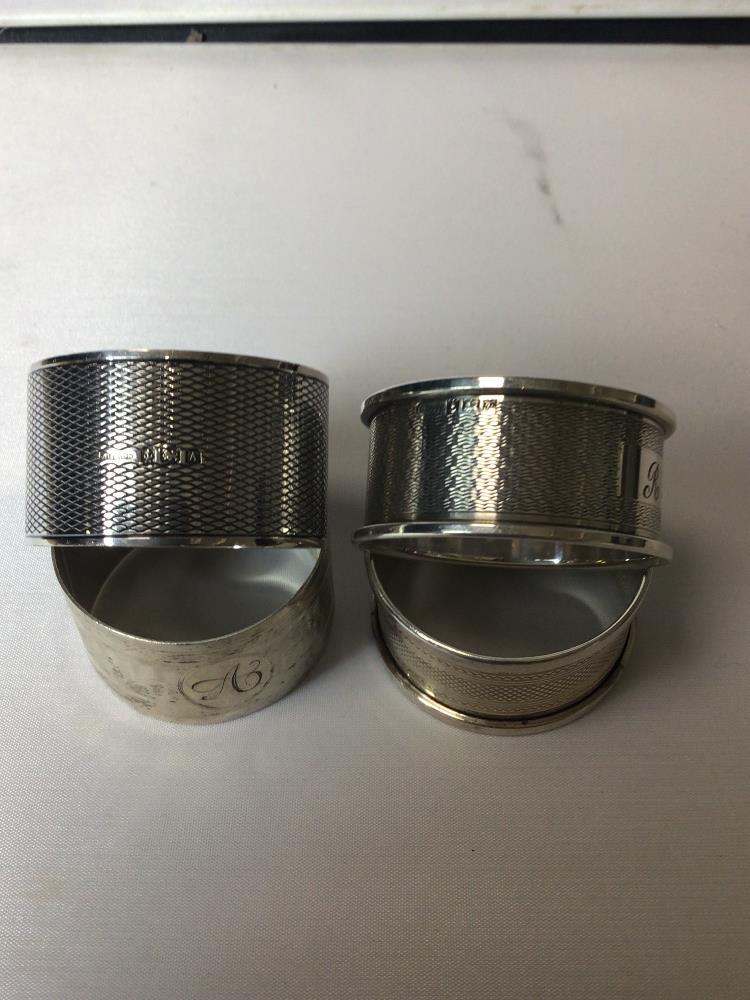 FOUR ENGINE TURNED HALLMARKED SILVER NAPKIN RINGS, 71 GRAMS - Image 3 of 4