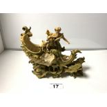 A PORCELAIN SHELL WITH FIGURES AND SEA SERPENT CENTRE PIECE IN THE MANNER OF ROYAL DUX A/F, 40 X