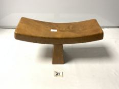 A HARDWOOD CURVED AFRICAN HEAD REST