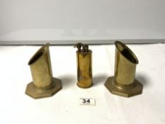 A 1942 TRENCH ART SHELL CASE TABLE LIGHTER, AND A PAIR OF SHELL VASES ON OCTAGONAL BASES