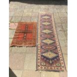 TURKISH WOOLEN RUG, 140 X 45CMS AND A PERSIAN PATTERN RUNNER CARPET, 29 X 80CMS