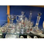 A LARGE SUITE OF GLASSWARE WITH ORGANIC COLOURED DECORATION, COMPRISING OF DECANTERS, JUGS,