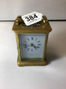 VINTAGE BRASS CARRIAGE CLOCK WITH FRENCH MOVEMENT, THE DIAL, THE SUSSEX GOLDSMITHS CO BRIGHTON,