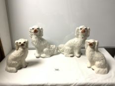 TWO PAIRS OF STAFFORDSHIRE POTTERY DOGS, THE TALLEST 30CMS