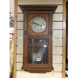 1930S OAK WALL CLOCK WITH PART GLAZED DOOR