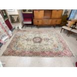 PERSIAN CLOSE PATTERN FLORAL DECORATED WOOLEN RUG WITH PINK BORDER, 202 X 302CMS