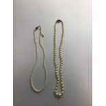 SEED PEARL NECKLACE WITH YELLOW METAL CLASP, AND CULTURED PEARL NECKLACE WITH STONE SET YELLOW METAL