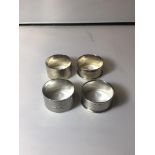 FOUR ENGINE TURNED HALLMARKED SILVER NAPKIN RINGS, 71 GRAMS