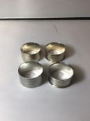 FOUR ENGINE TURNED HALLMARKED SILVER NAPKIN RINGS, 71 GRAMS