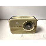 A BUSH 1960S STYLE PORTABLE RADIO