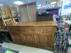 HEAVY OAK MODERN SIDEBOARD WITH FOUR DRAWERS AND THREE CUPBOARDS ON PLINTH BASE, 187 X 52 X 98.5CMS