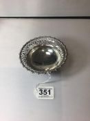 HALLMARKED SILVER CIRCULAR BONBON DISH WITH PIERCED BORDER ON PAD FEET A/F, 12.5CMS BY JAMES DIXON &