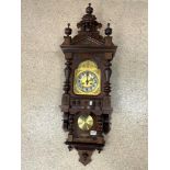 A WALNUT VIENNA WALL CLOCK WITH BRASS AND SILVERED DIAL