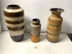 THREE 1960S WEST GERMAN POTTERY SLIP DECORATED VASES, THE TALLEST 46CMS
