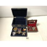 QUANTITY OF COSTUME JEWELLERY AND BADGES, VARIOUS IN TWO JEWELLERY BOXES