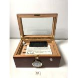 A GLAZED WOODEN CIGAR HUMIDOR