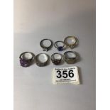 SIX SILVER RINGS WITH STONES WITH ONE OTHER YELLOW METAL