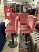 SET OF FOUR METAL BASE AND UPHOLSTERED SWIVEL BAR STOOLS