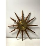 MID-CENTURY TEAK AND BRASS STARBURST WALL CLOCK