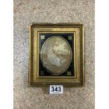 A SMALL REGENCY OVAL SILK WORK PICTURE OF A SEATED WOMAN WITH SHEEP, 12 X 9CMS