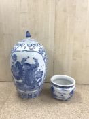 A 20TH CENTURY CHINESE BLUE AND WHITE LIDDED VASE, 60CMS AND A DRAGON DECORATED JARDINERE