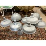 EIGHT GALVANISED INDUSTRIAL HANGING LIGHTS, AND A LAMP
