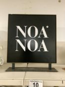 A VINTAGE NOA NOA FASHION SHOP COUNTER SIGN, 46 X 40CMS