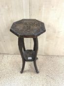 A SMALL TWO-TIER CARVED OCCASIONAL TABLE