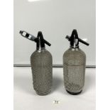 TWO VINTAGE DESIGN SODA SYPHONS WITH MESH COVERING