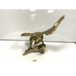 A BRASS MODEL OF AN EAGLE