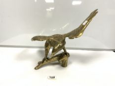 A BRASS MODEL OF AN EAGLE