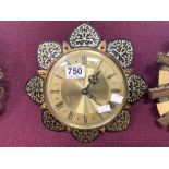 A 1960S FLOWER DESIGN METAMEC WALL CLOCK