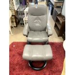 EKORNESS LEATHER SWIVEL EASY CHAIR AND MATCHING FOOTSTOOL