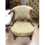VICTORIAN UPHOLSTERED WALNUT NURSING CHAIR OF QUALITY ON TURNED LEGS WITH ORIGINAL CASTORS STAMPED
