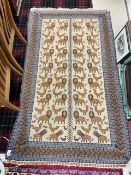 PERSIAN ANIMAL PATTERNED RUG, 116 X 200CMS