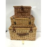 THREE GRADUATING WICKER PICNIC BASKETS