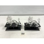 TWO SWAROVSKI CRYSTAL DRAGONS ON STANDS